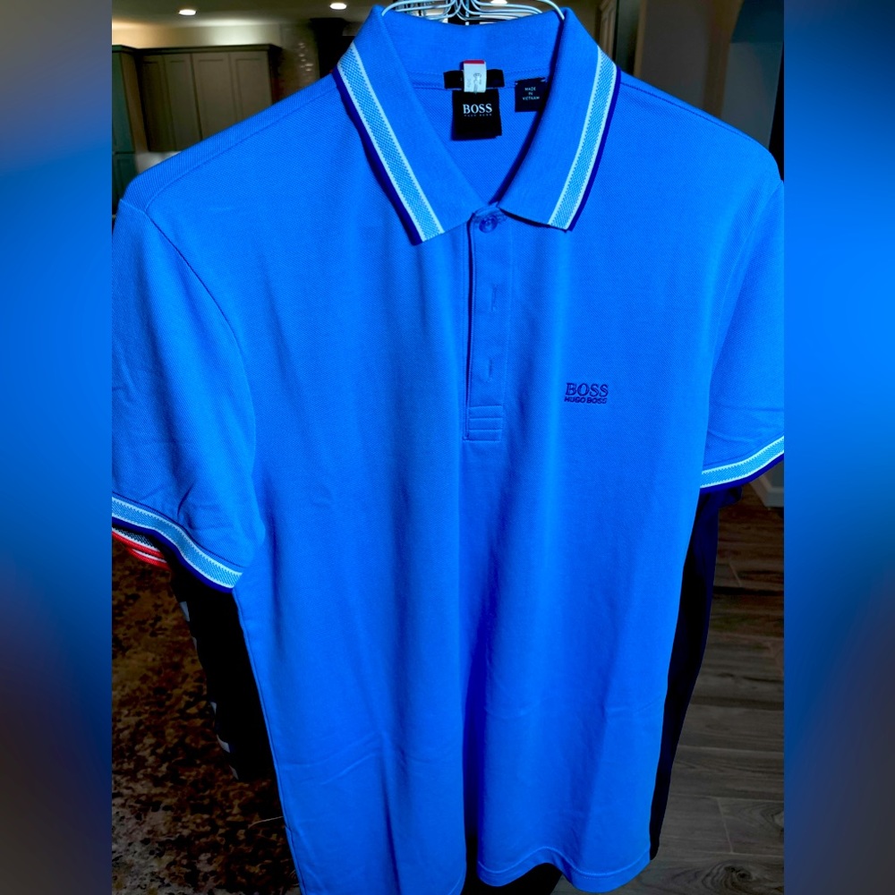 Boss polos size L. In great condition barely worn.